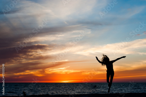 A Young Girl Child Kid Teenager Woman Lady Dancing in the Sunlight Sunset Blue Orange Silhouette Shadow Black Sky Colorful Get Outside Fresh Air Childhood Unplugged Play Run Wind Fun 