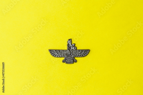 Photography zoroastrian symbol on yellow background