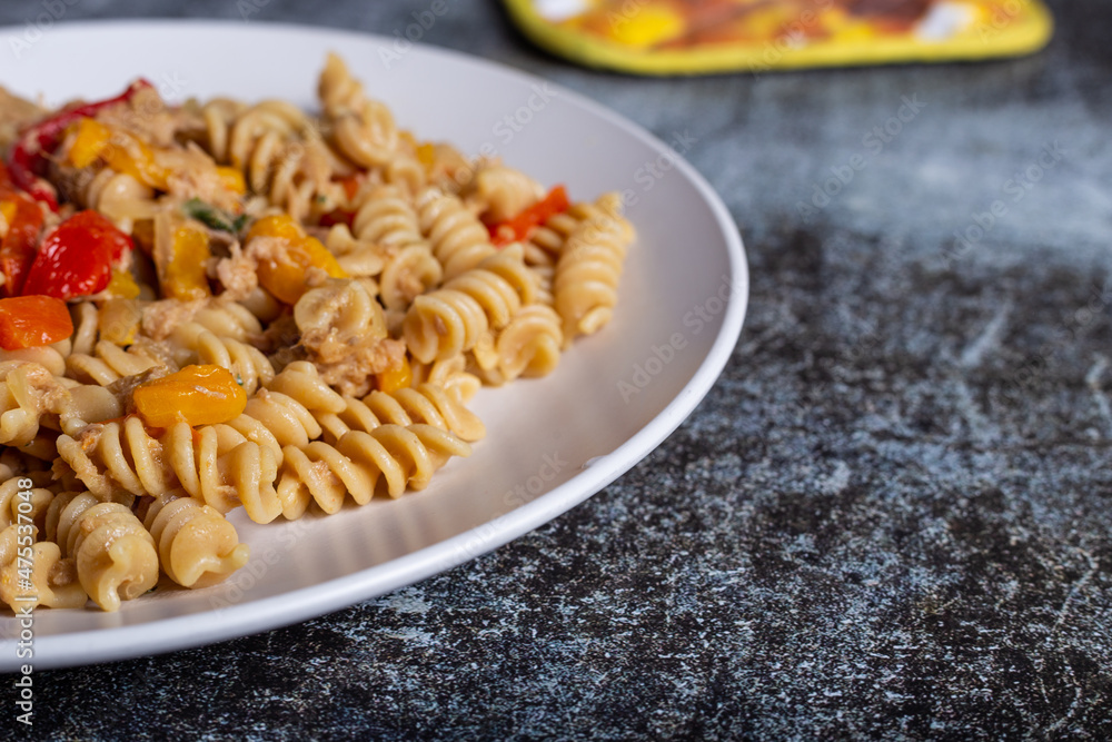 Pasta with peperoni, tuna and onion. Typical dish of the Mediterranean diet Pasta with peperoni, tuna and onion. Typical dish of the Mediterranean diet