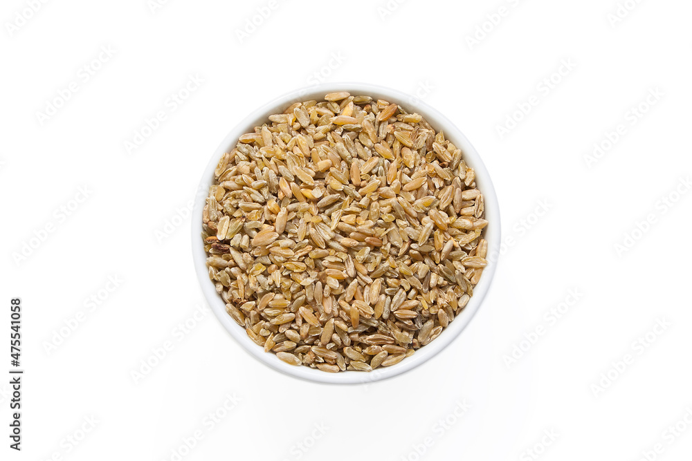 Freekeh in a bowl isolation from above Freekeh in a bowl isolation from above
