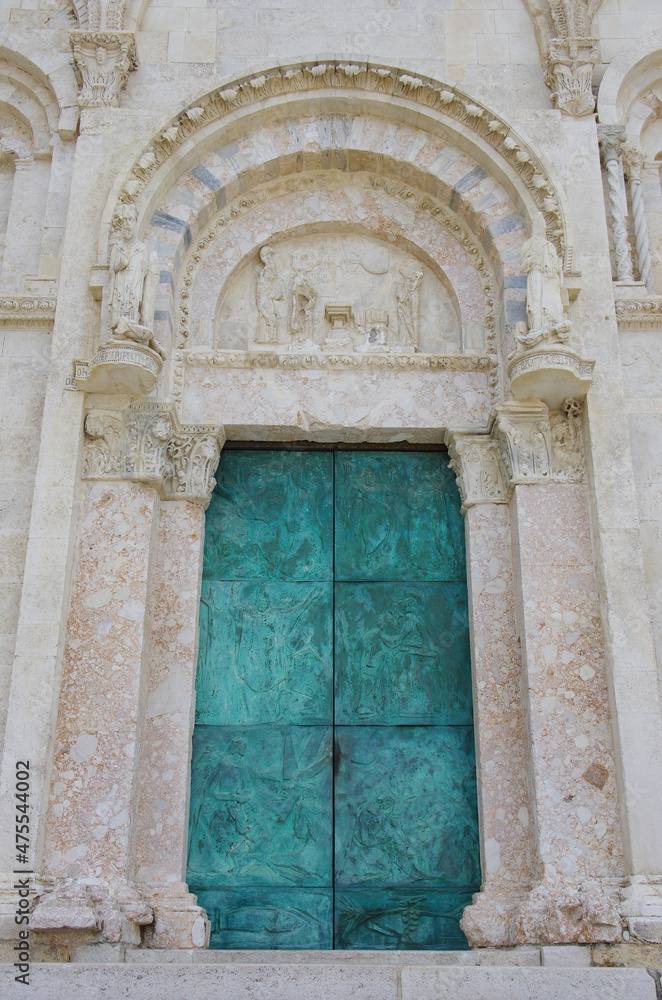The precious bronze portal of the Cathedral of Termoli, is located in the old village and is a symbol of the seaside town