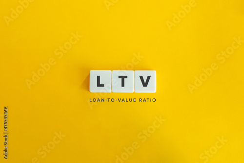 Loan-to-Value (LTV) Ratio Banner. Block letters on bright orange background. Minimal aesthetics.