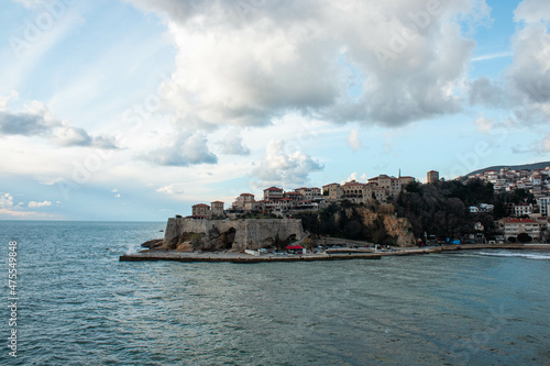 Beautiful shot of the old town of Ulcinj and the Adriatic sea under a blue cloudy sky photo