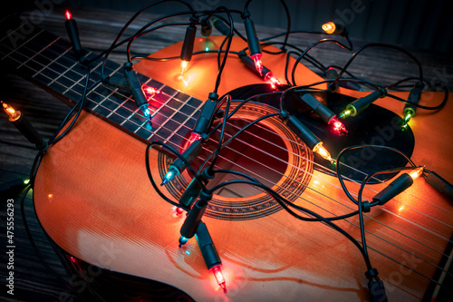 colorful fairy lights on a classical guitar