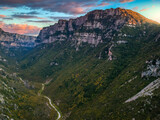 Aerial panoramic view of the impressive Vikos gorge in the Zagoria region at Pindus Mountains of northern Greece. It lies on the southern slopes of Mount Tymfi and it is the the deepest in Europe.