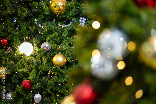 Close up Christmas tree and decorations and light bokeh background.Merry Christmas and New Year concept.