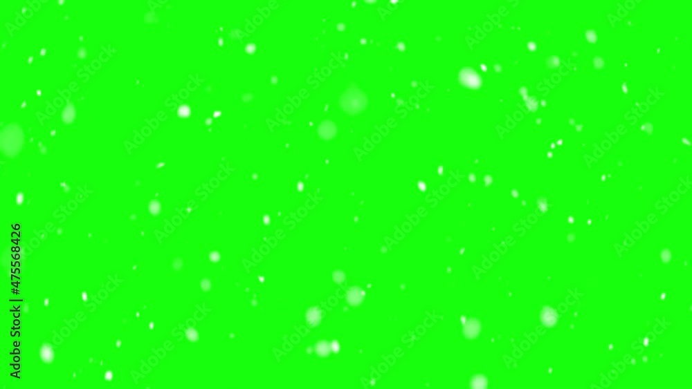 It is snowing winter real snow on green screen background It is snowing winter real snow on green screen background