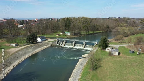 Weir On Morava River, Hydro-electric Power Station, drone aerial video shot, regulated river Morava regulation flood protection measures large stones concrete, increasing banks, building flood valleys photo