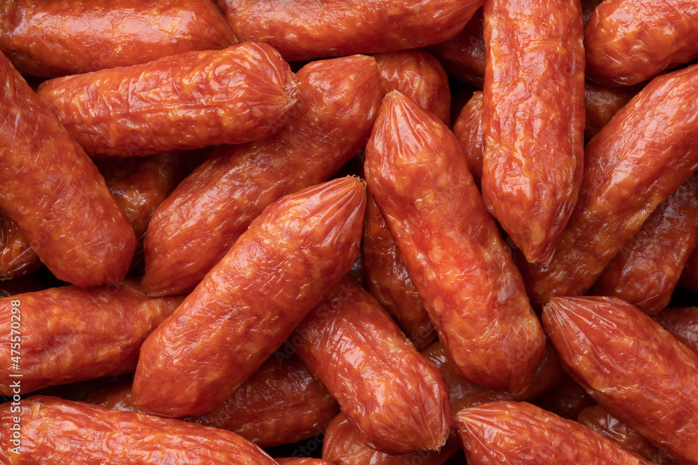 Small cabanossi sausages close up full frame as a background Small cabanossi sausages close up full frame as a background