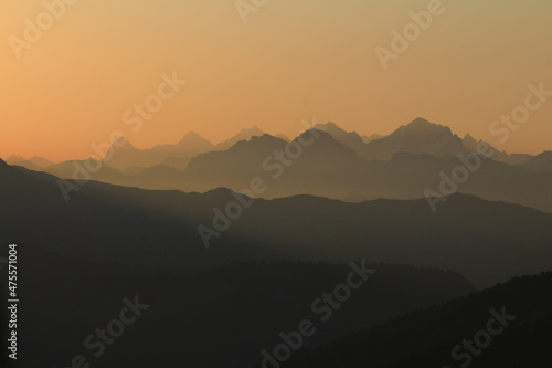 Sunrise view from a place near Gstaad, Switzerland. Mountain ranges in the Bernese Oberland.