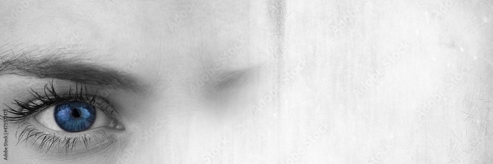 Fototapeta premium Composite image of close up of a female eye and grunge effect textured background