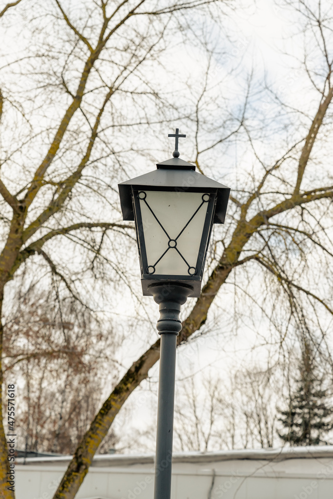 Metal street lamp with cross retro style outdoors object colored Metal street lamp with cross retro style outdoors object colored