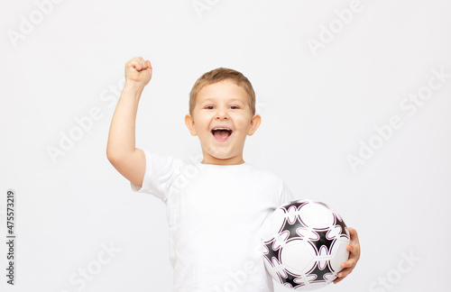 Fan sport boy player hold soccer ball celebrating happy smiling laughing free text copy space isolated on white background