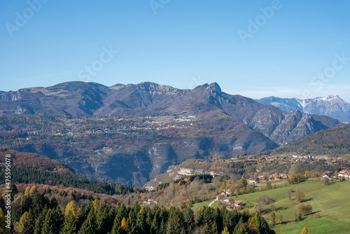 Beautiful view of dense trees and mountains in Asiago, Northeastern Italy