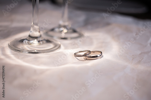 Wedding rings with white gold on a white background