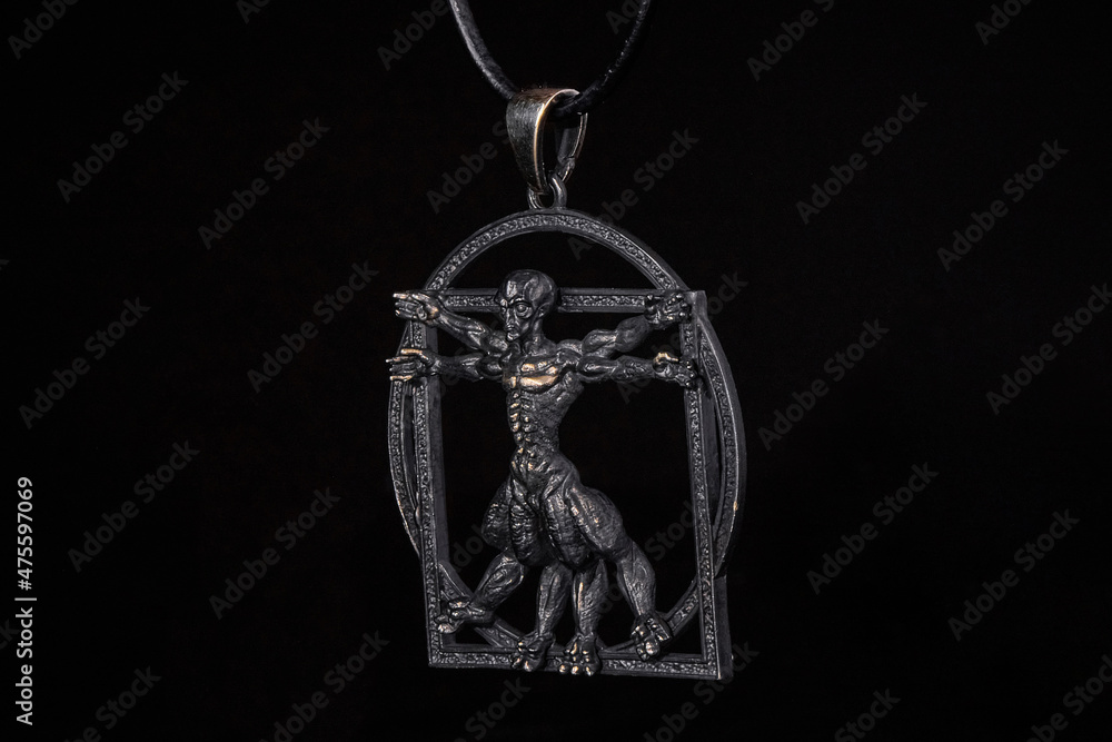 Figure of an alien astronaut on a suspension Figure of an alien astronaut on a suspension