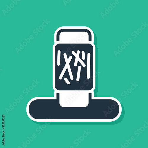 Blue Cat scratching post with toy icon isolated on green background. Vector