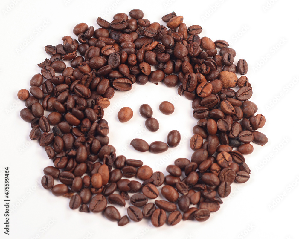 Smileys in coffee beans, a cheerful message from coffee beans. Smileys in coffee beans, a cheerful message from coffee beans.