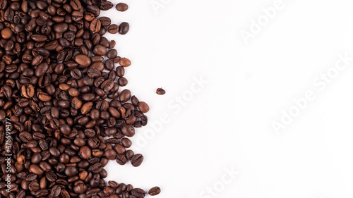 Coffee beans borders made from roasted coffee beans. Top view, close up, place for text. Blank for text.