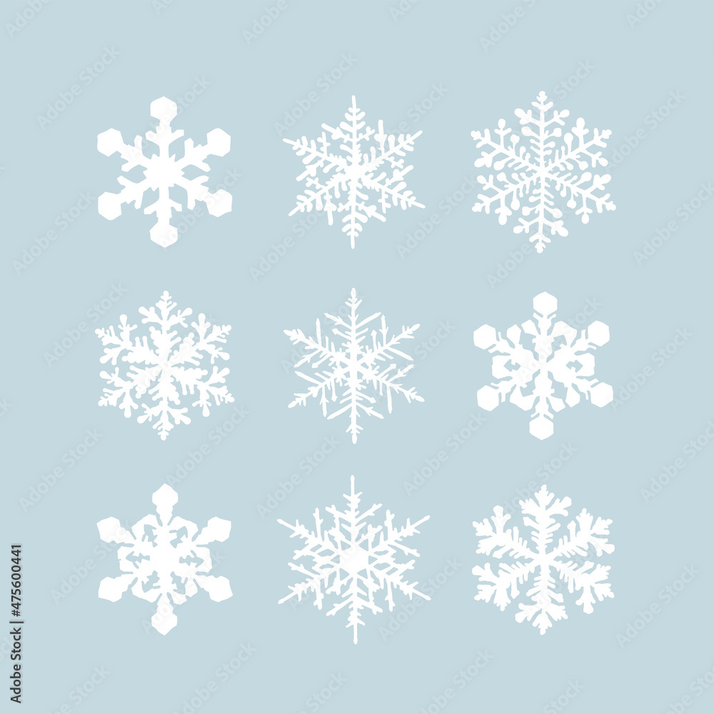 A set of snowflakes to create a winter pattern. Hand-drawn style