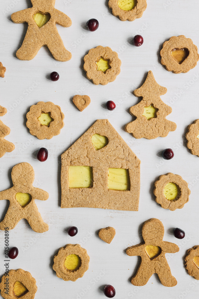 DIY Stained Glass Christmas Cookies. Flat lay, top view. Festive food pattern. DIY Stained Glass Christmas Cookies. Flat lay, top view. Festive food pattern.