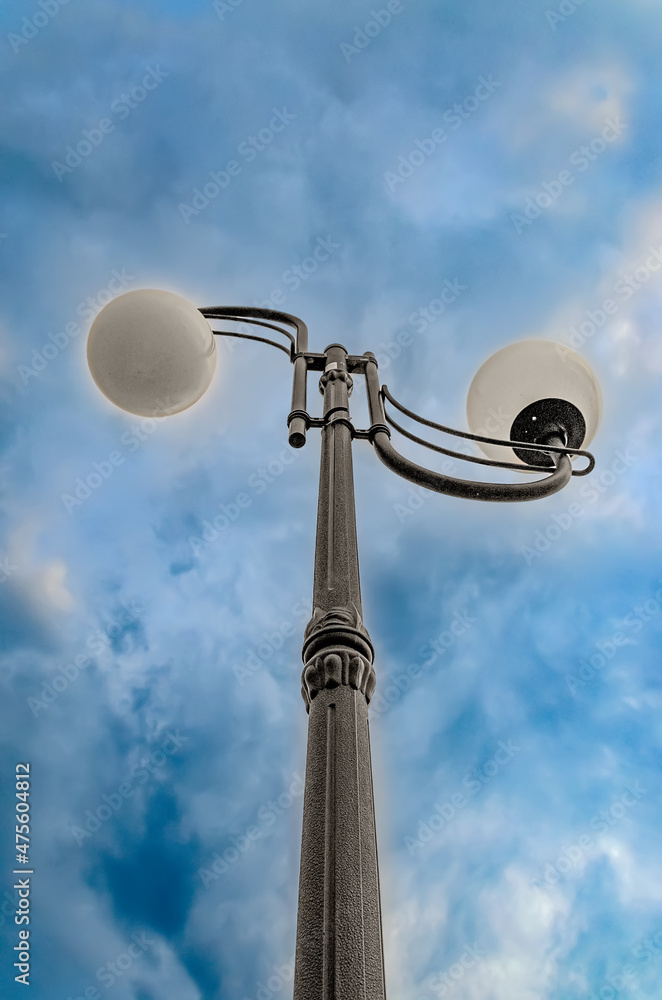 Street lamp against the backdrop of a stormy sky.