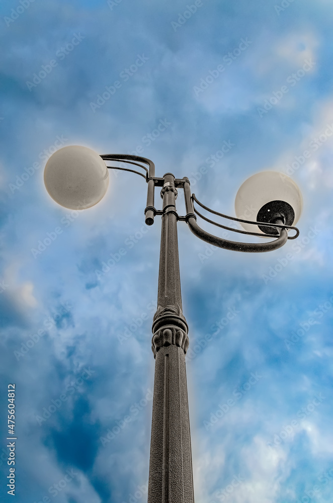 Street lamp against the backdrop of a stormy sky. Street lamp against the backdrop of a stormy sky.