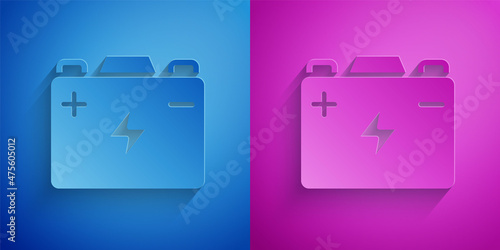 Paper cut Car battery icon isolated on blue and purple background. Accumulator battery energy power and electricity accumulator battery. Paper art style. Vector