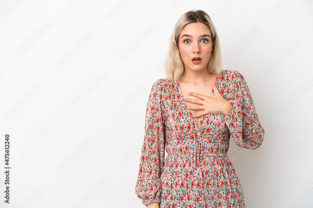 Young caucasian woman isolated on white background surprised and shocked while looking right Young caucasian woman isolated on white background surprised and shocked while looking right