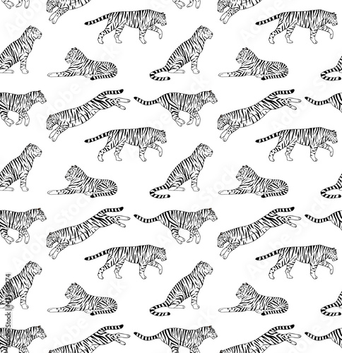 Vector seamless pattern of hand drawn doodle sketch tigers isolated on white background