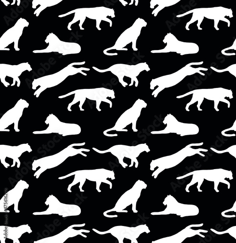 Vector seamless pattern of hand drawn tigers silhouette isolated on black background