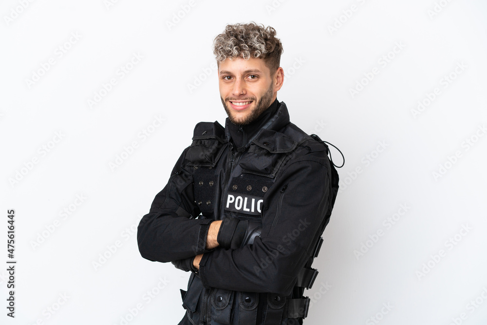 Fototapeta premium SWAT caucasian man isolated on white background with arms crossed and looking forward