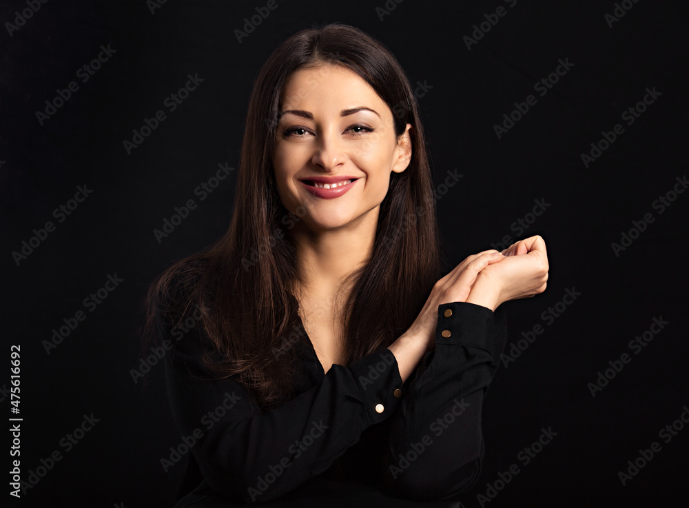 Beautiful confident happy smiling business woman with folded arms on black background with empty copy space. Closeup portrait Beautiful confident happy smiling business woman with folded arms on black background with empty copy space. Closeup portrait