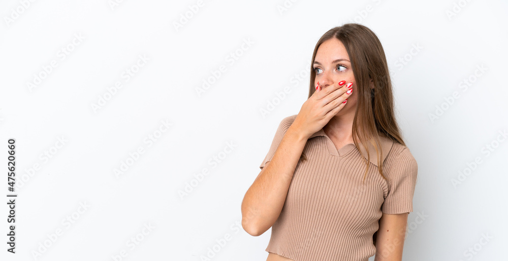 Young Lithuanian woman isolated on white background doing surprise gesture while looking to the side Young Lithuanian woman isolated on white background doing surprise gesture while looking to the side