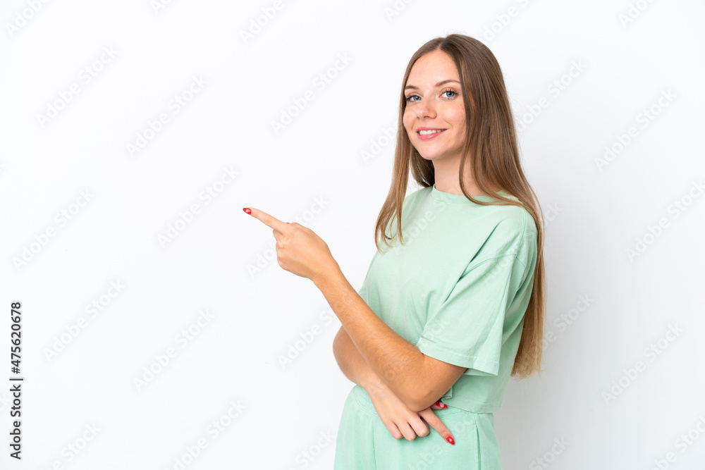 Young Lithuanian woman isolated on white background pointing finger to the side Young Lithuanian woman isolated on white background pointing finger to the side
