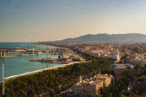 Aerial view of Malaga City under the sunset on the coast photo