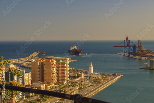 Aerial view of Malaga City under the sunset on the coast photo