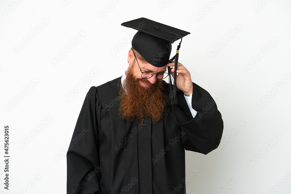 Young university graduate reddish man isolated on white background laughing Young university graduate reddish man isolated on white background laughing