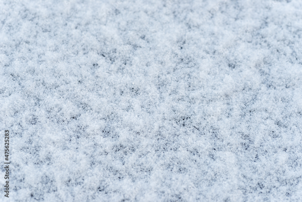 Lightly piled snow on black table in Japan Lightly piled snow on black table in Japan