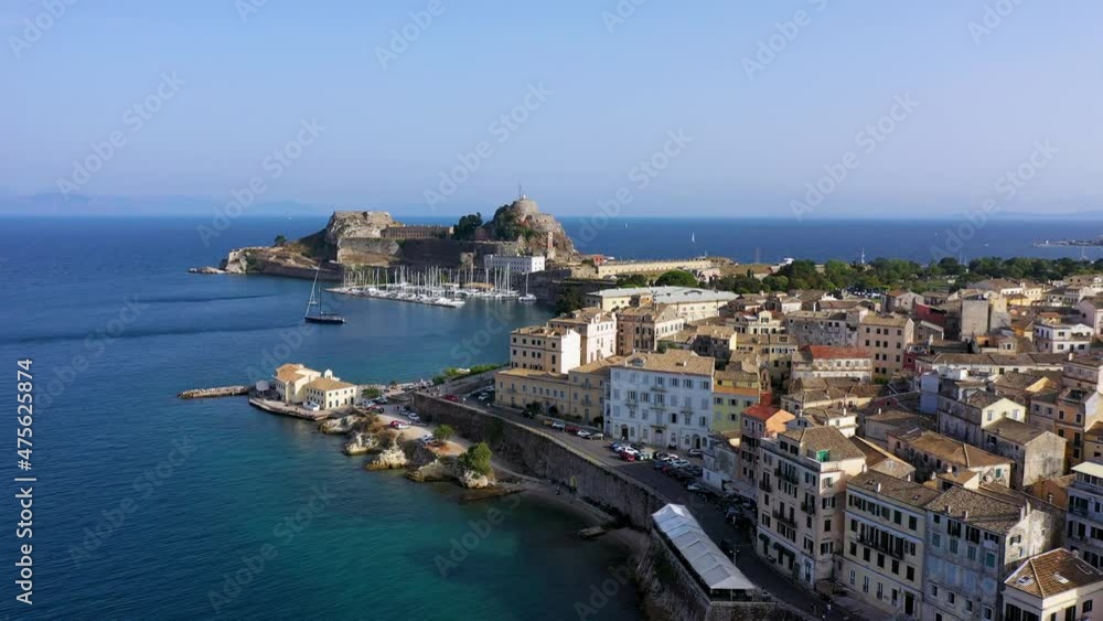 Panoramic view of Kerkyra, capital of Corfu island, Greece. Aerial drone view of Kerkyra with beautiful buildings during summer sunny day. Corfu island, Greece. Panoramic view of Kerkyra, capital of Corfu island, Greece. Aerial drone view of Kerkyra with beautiful buildings during summer sunny day. Corfu island, Greece.