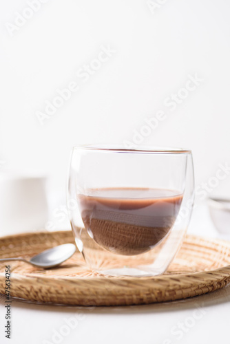 hot chocolate in a glass on a white background