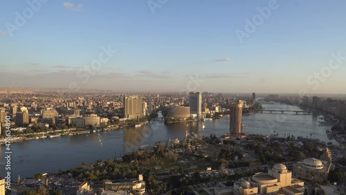 Cairo, Egypt - June 25, 2021 - aerial panorama view of the Nile with Cairo skyline at sunset seen from Cairo Tower