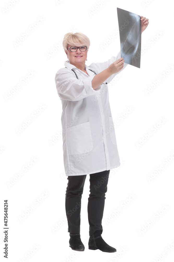 in full growth. competent doctor with an x-ray. in full growth. competent doctor with an x-ray.