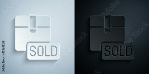 Paper cut Sold icon isolated on grey and black background. Paper art style. Vector