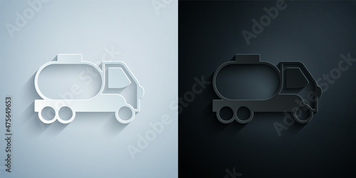 Paper cut Tanker truck icon isolated on grey and black background. Petroleum tanker, petrol truck, cistern, oil trailer. Paper art style. Vector
