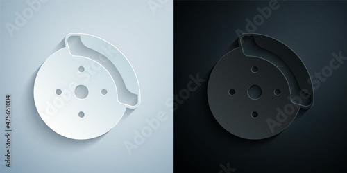 Paper cut Car brake disk with caliper icon isolated on grey and black background. Paper art style. Vector