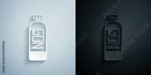Paper cut Nitrous oxide icon isolated on grey and black background. Paper art style. Vector