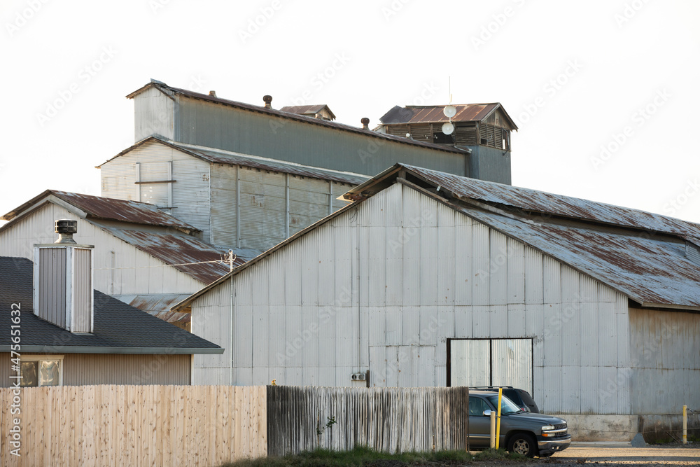 Late afternoon view of industrial buildings in Wheatland, California, USA. Late afternoon view of industrial buildings in Wheatland, California, USA.