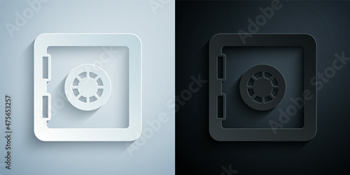 Paper cut Safe icon isolated on grey and black background. The door safe a bank vault with a combination lock. Reliable Data Protection. Paper art style. Vector