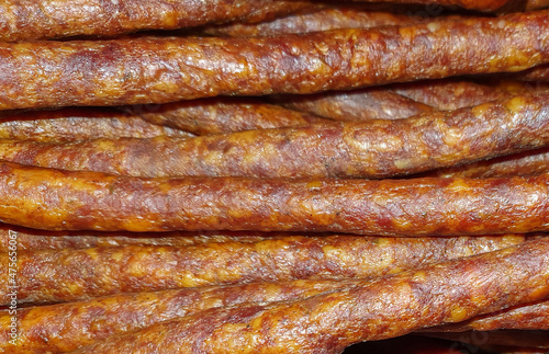 many smoked homemade sausages in closeup
